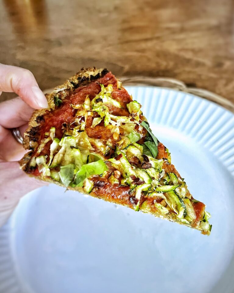 chicken crust pizza slice with toppings