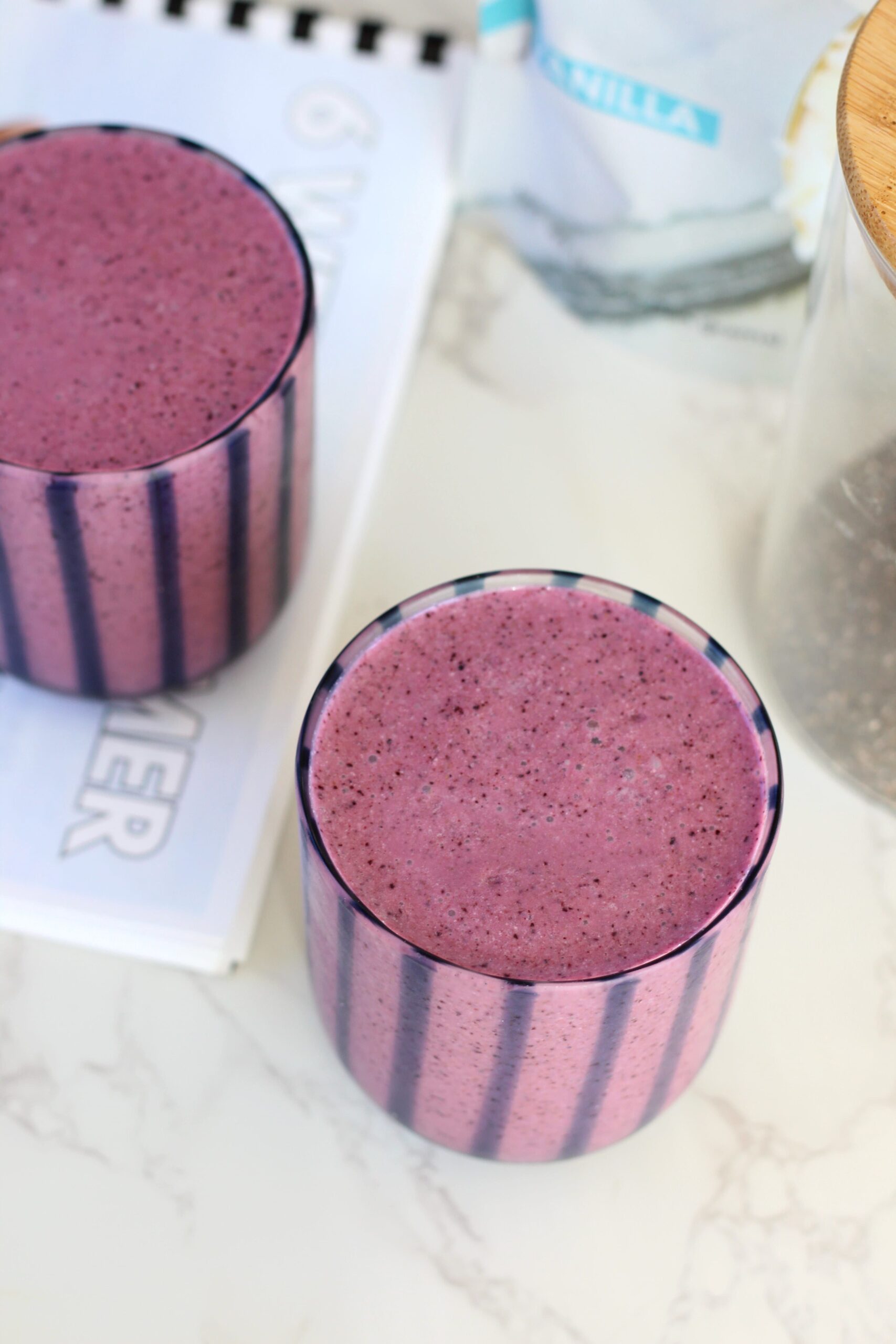 blueberry mint probiotic smoothie in two glasses