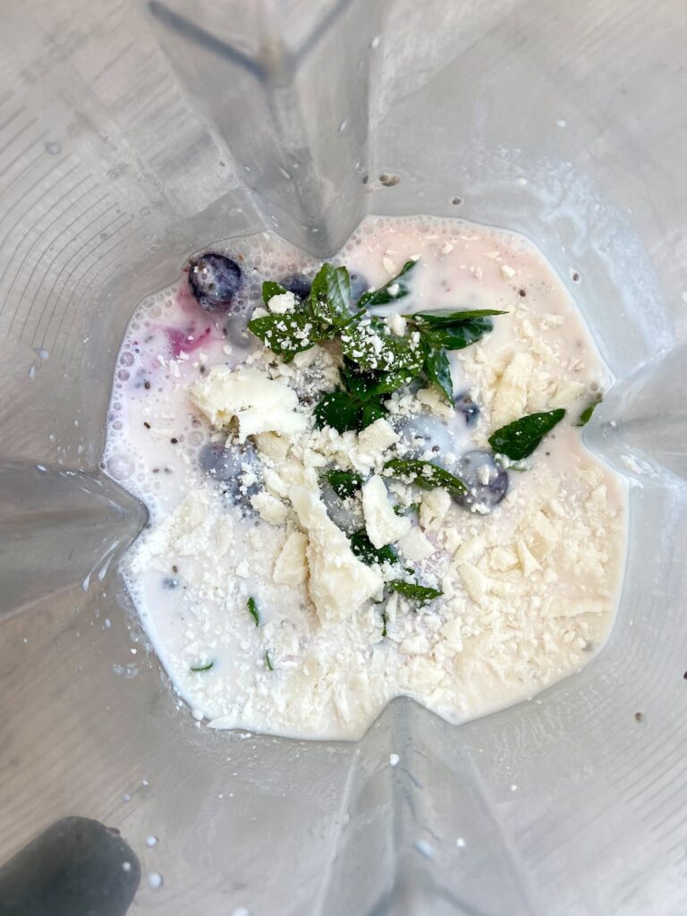 blueberry mint probiotic smoothie ingredients in a blender
