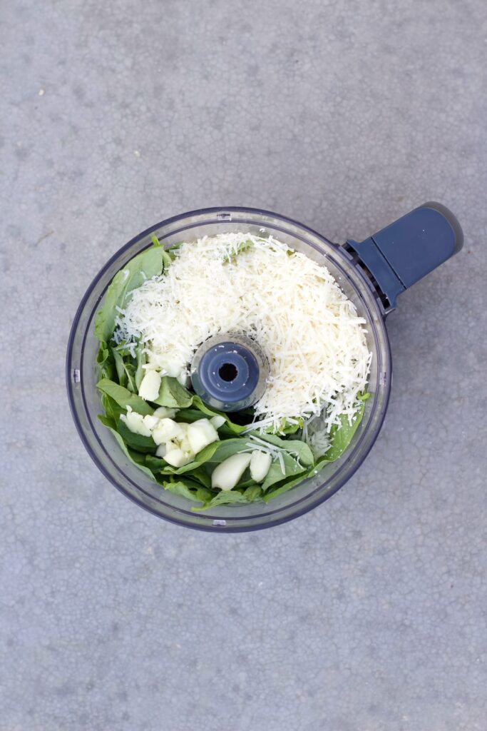 pesto without pine nuts in a food processor before blending
