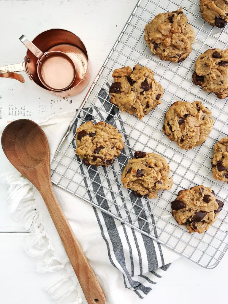 gluten-free chocolate chip cookies on a wire cooling rack