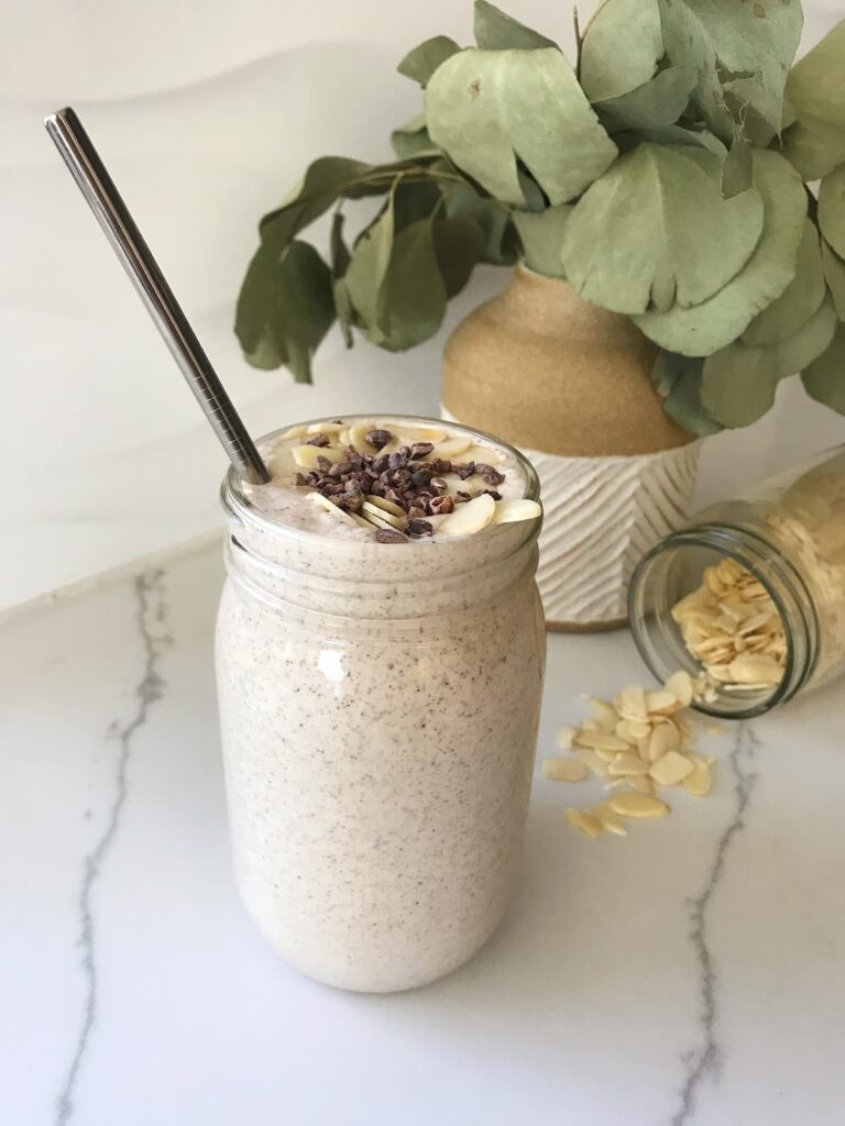 chocolate almond butter smoothie with cacao nibs on top