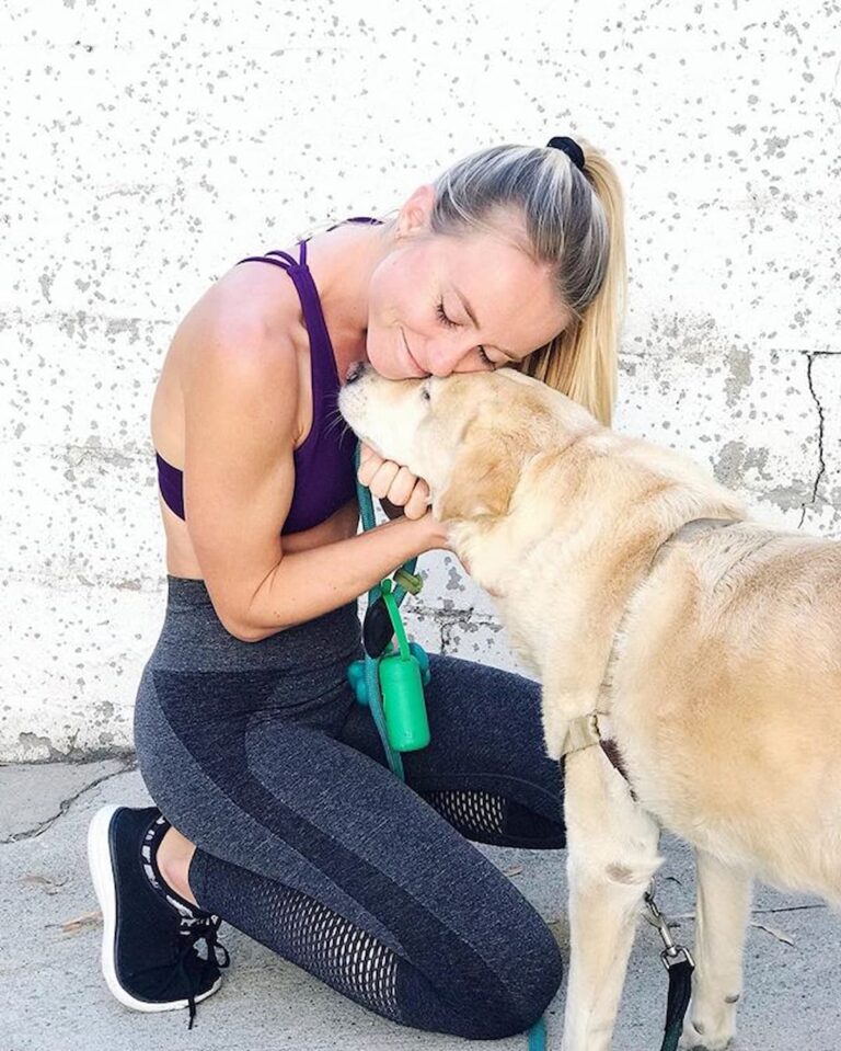 snuggling with a dog for a walk