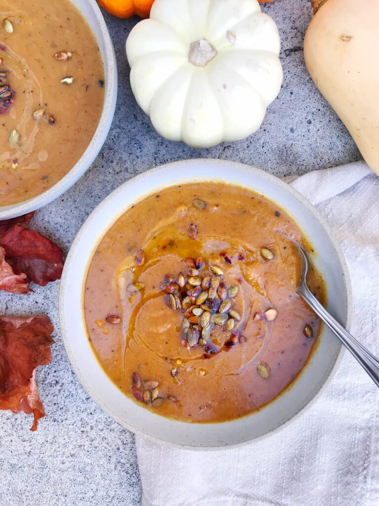 roasted vegetable soup bowls with pumpkin seed topping