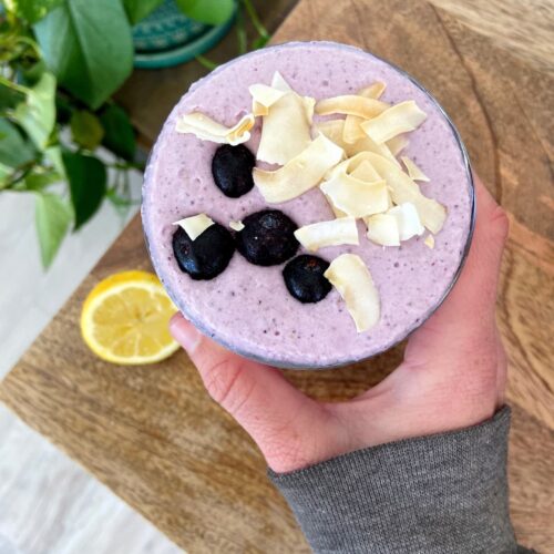 lemon blueberry pie protein smoothie in a glass