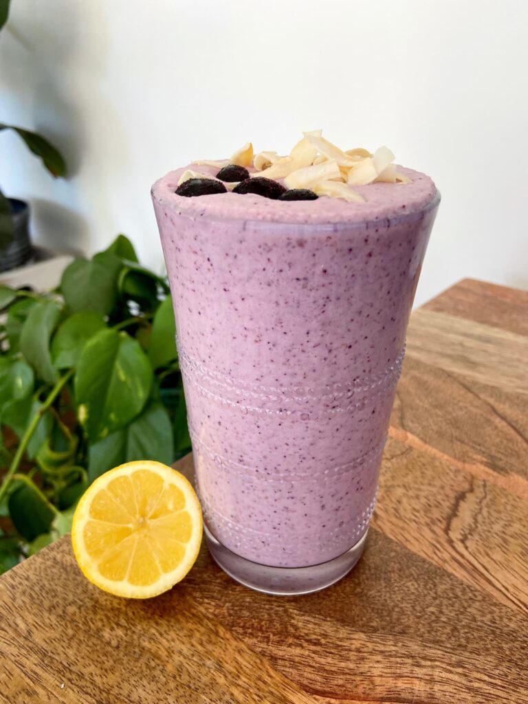 lemon blueberry pie protein smoothie in a glass