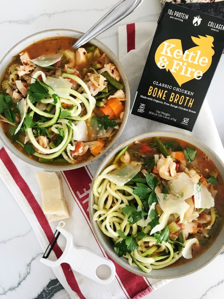 minestrone soup bowls with veggies, parmesan and bone broth