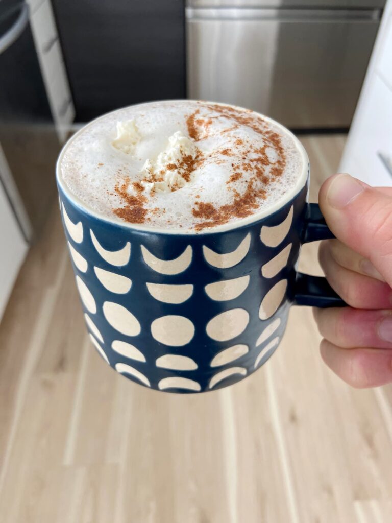 pumpkin spice protein hot chocolate in a mug