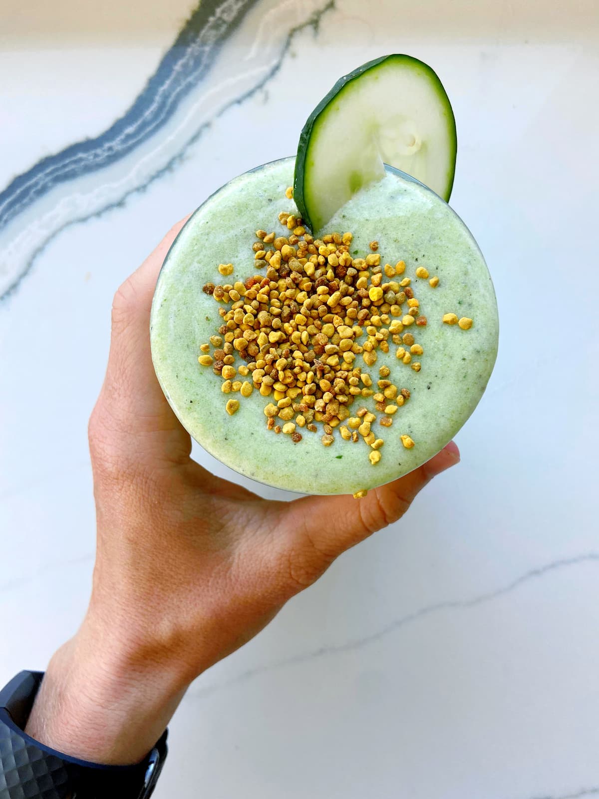 cucumber smoothie with bee pollen topping