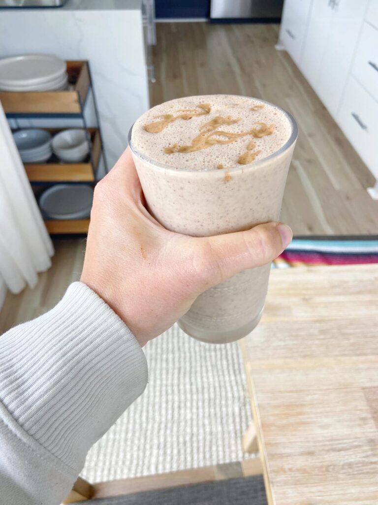almond butter smoothie in a glass