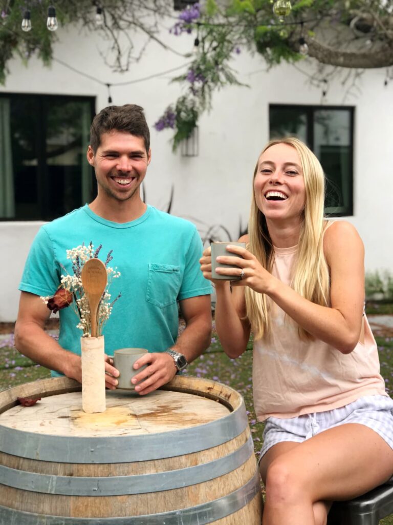 autumn and trevor drinking coffee at a wine casket
