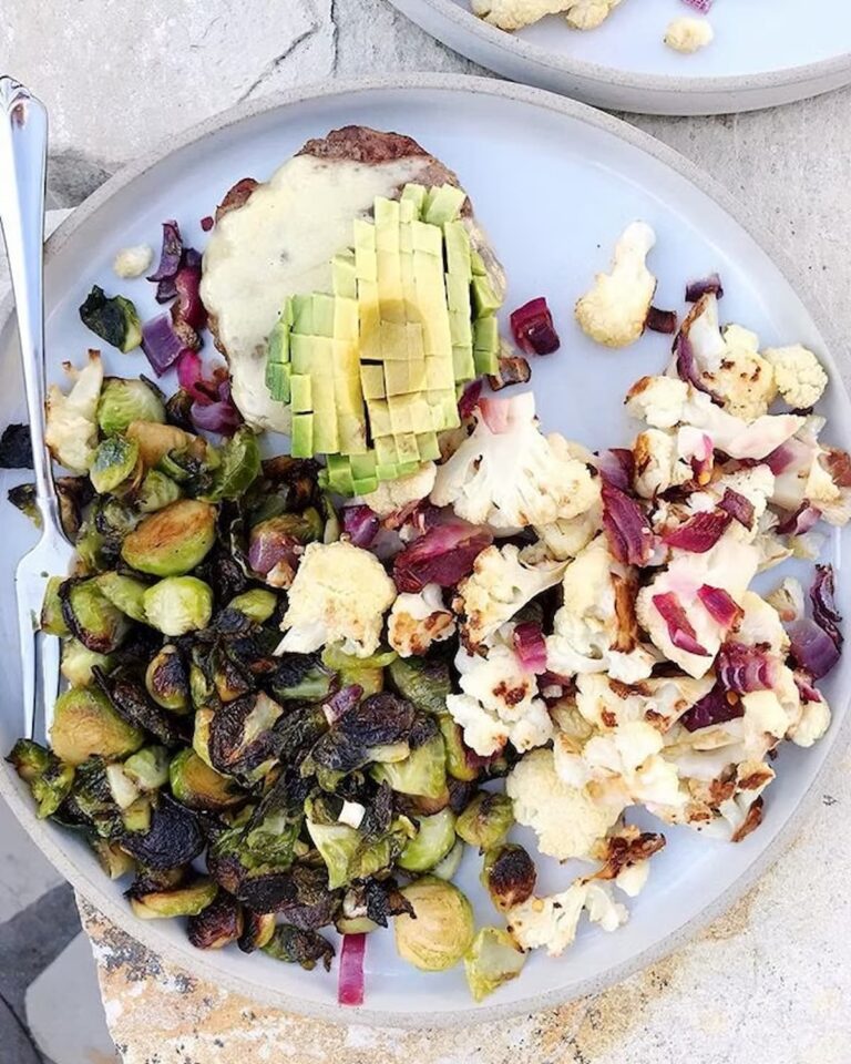burger with avocado and roasted brussels sprouts and cauliflower