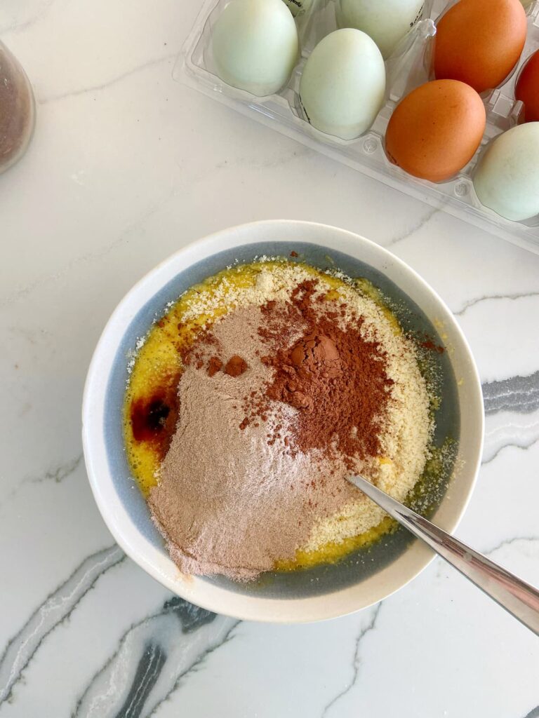 brownie protein mug cake ingredients in a bowl