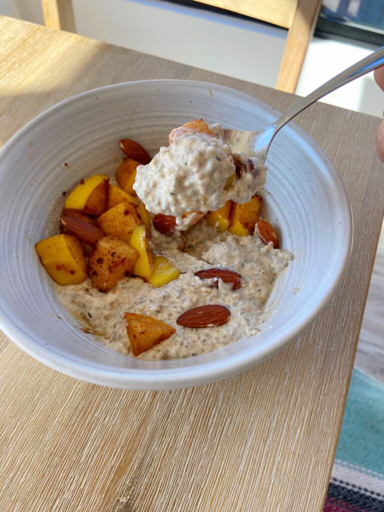 cinnamon apple low carb oatmeal in a bowl with a spoon