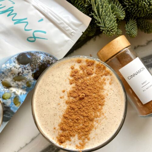 banana peanut butter protein smoothie with cinnamon topping
