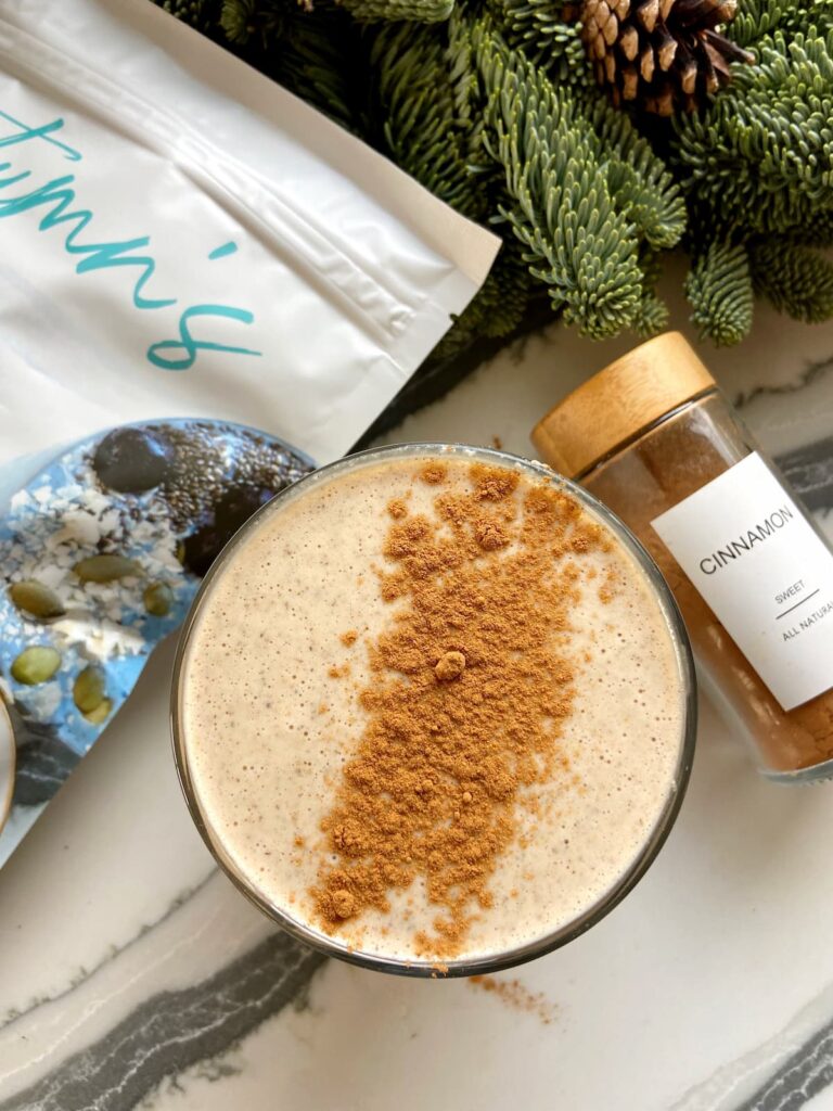 banana peanut butter protein smoothie with cinnamon topping