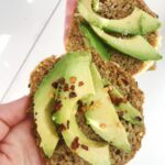 flaxseed bread with avocado on top