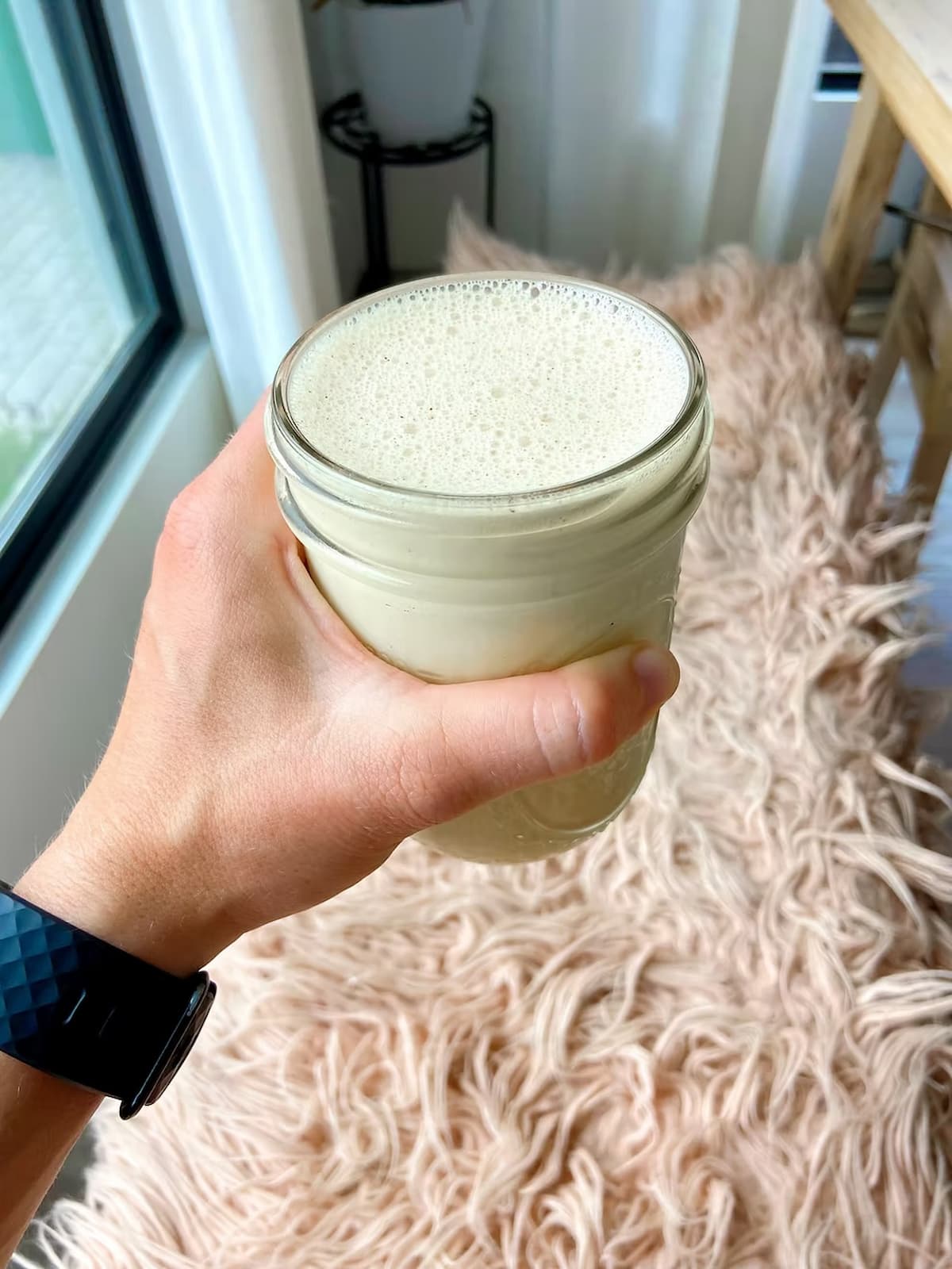 golden milk smoothie in a mug