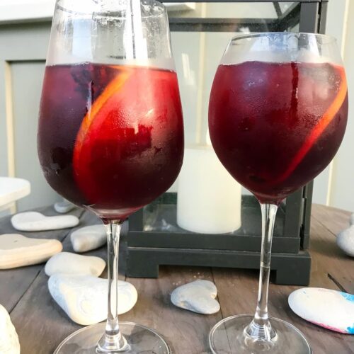 mulled wine poured into wine glasses