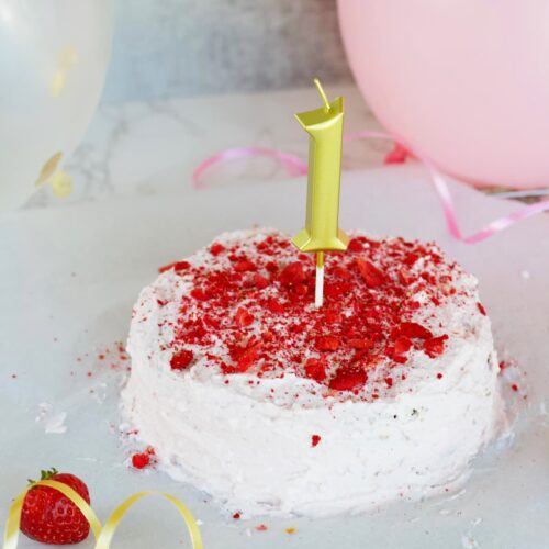 healthy smash cake with a candle