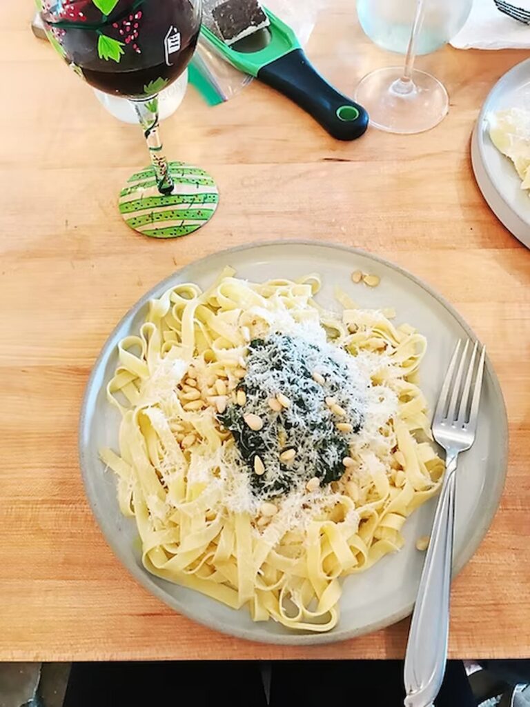homemade pasta with pesto on top