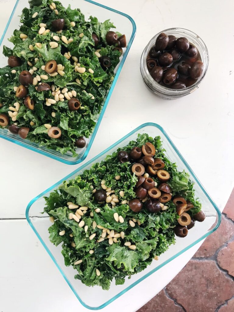 kale salad with olives and pine nuts