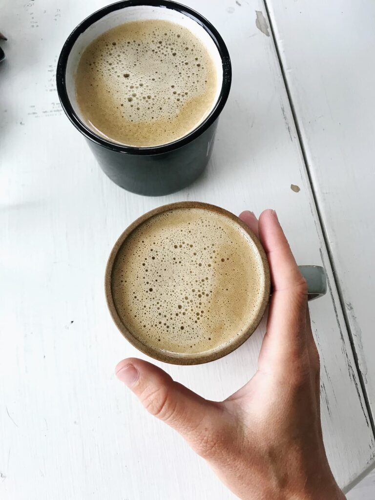 two keto coffee cups on a white table