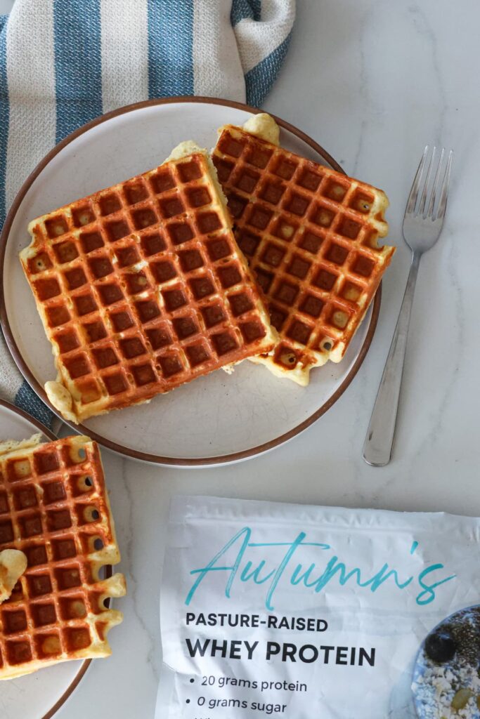 vanilla protein waffle on a plate with a fork