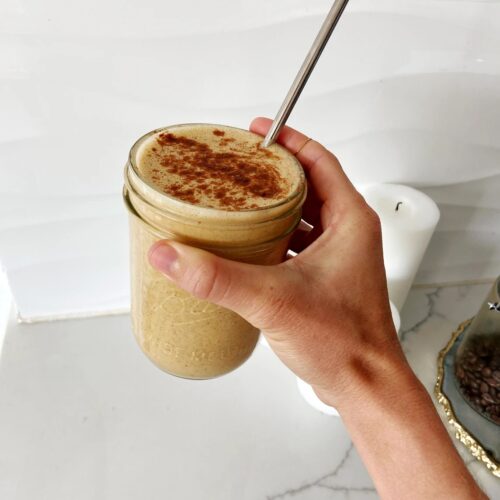 pumpkin spice latte protein smoothie in a glass
