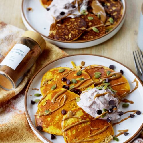 pumpkin protein pancakes on a plate with toppings