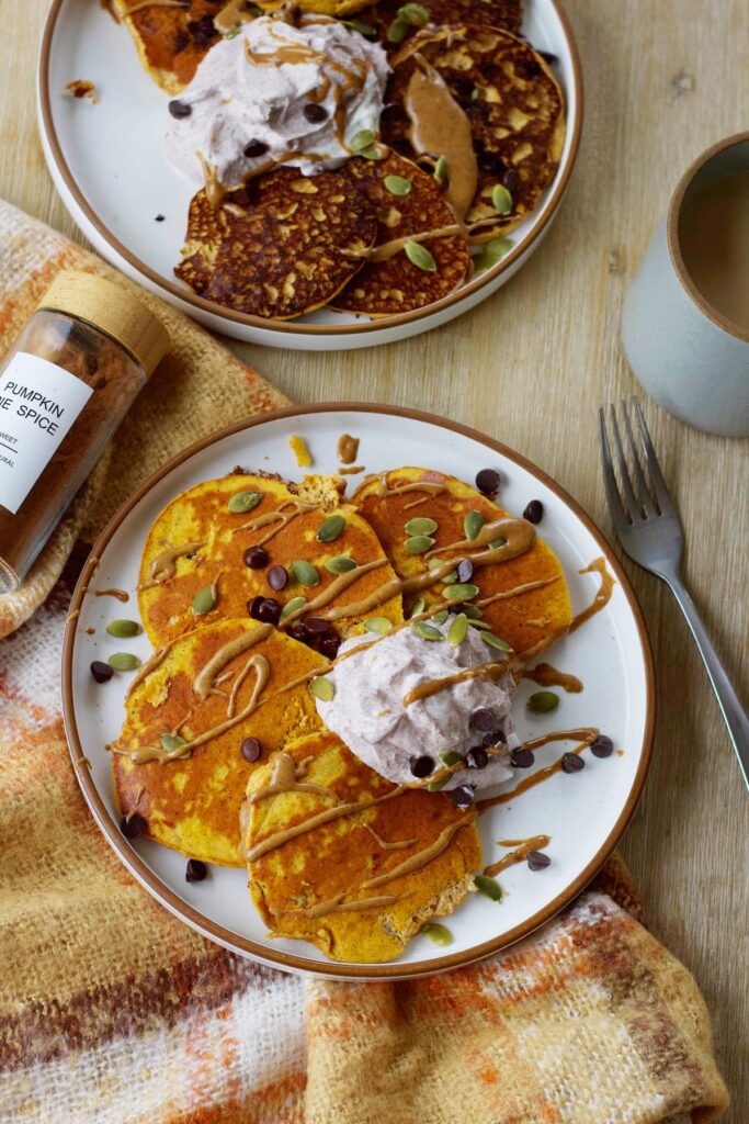 pumpkin protein pancakes overhead shot with toppings