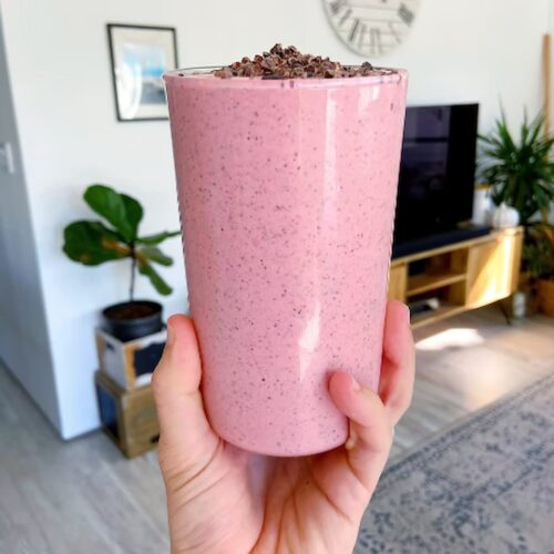 raspberry protein smoothie in a glass