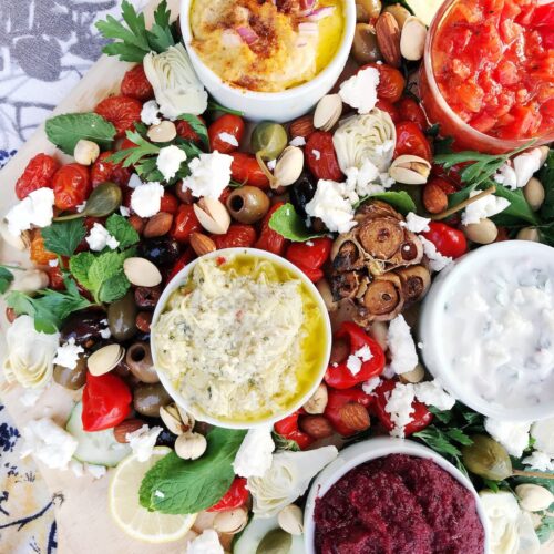 roasted beet dip on a platte with veggies and other dips