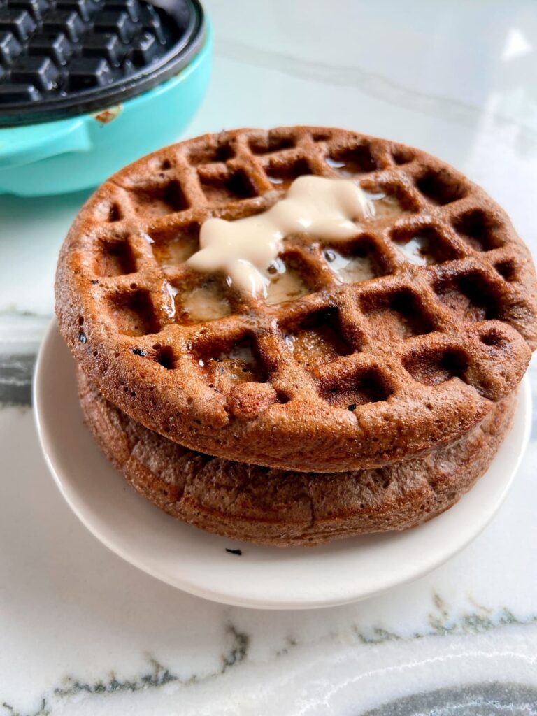spiced chocolate protein waffle with butter topping