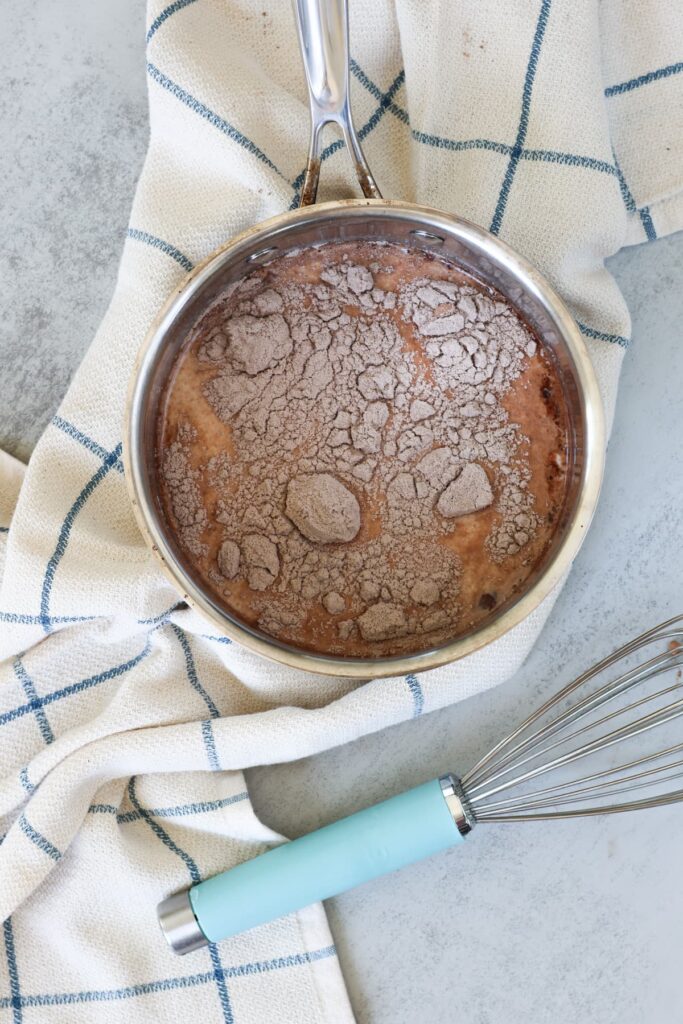 protein hot chocolate ingredients in a pot