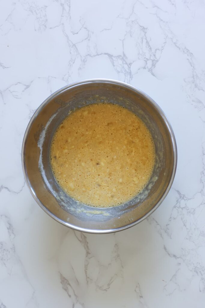 vanilla protein waffles ingredients mixed in a bowl