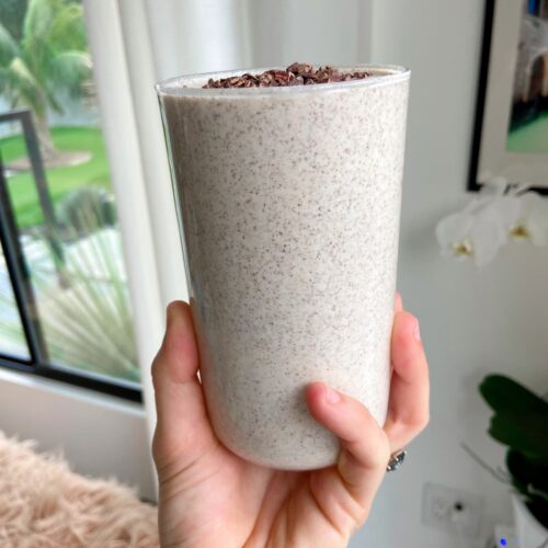 peanut butter protein smoothie with cacao nib topping