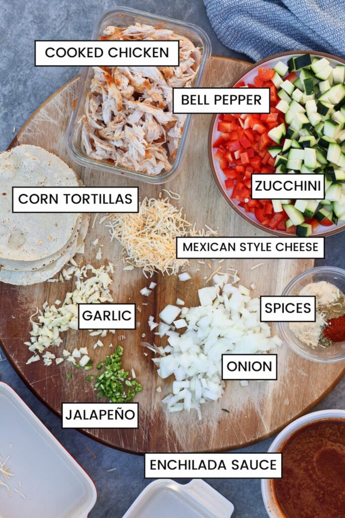 healthy chicken enchilada ingredients on a cutting board
