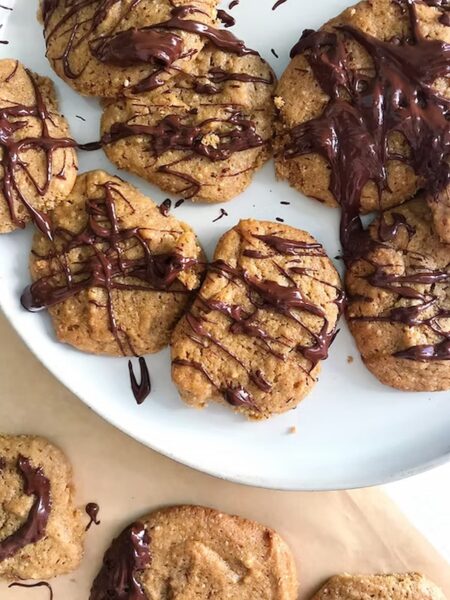 grain-free chocolate dipped cookies on a plate