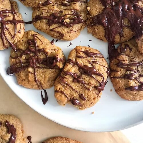 grain-free chocolate dipped cookies on a plate
