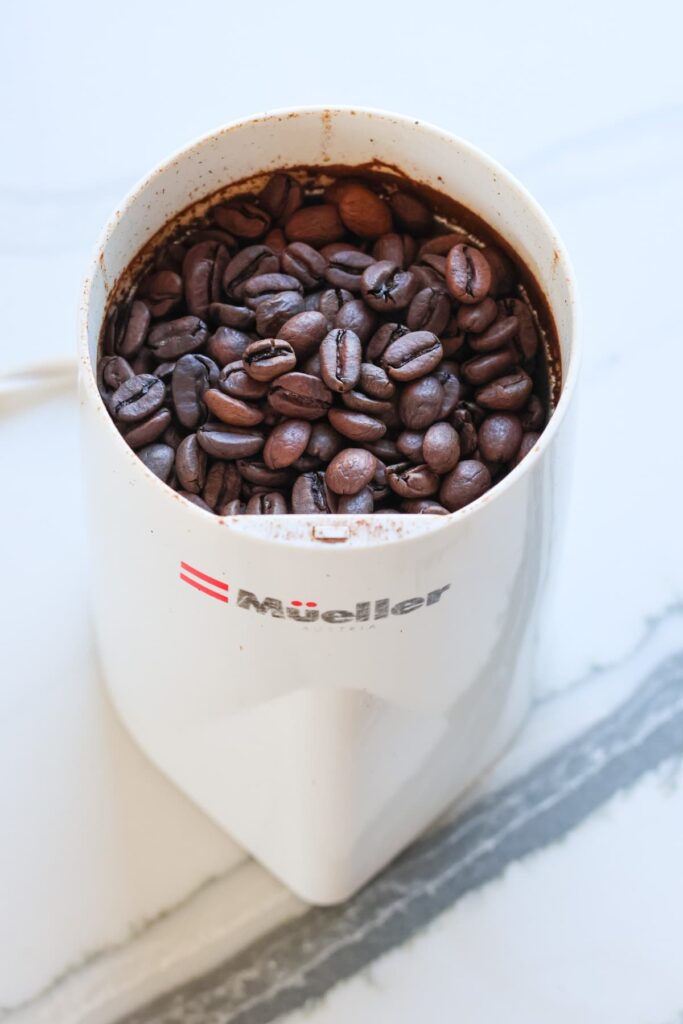 coffee beans in a grinder