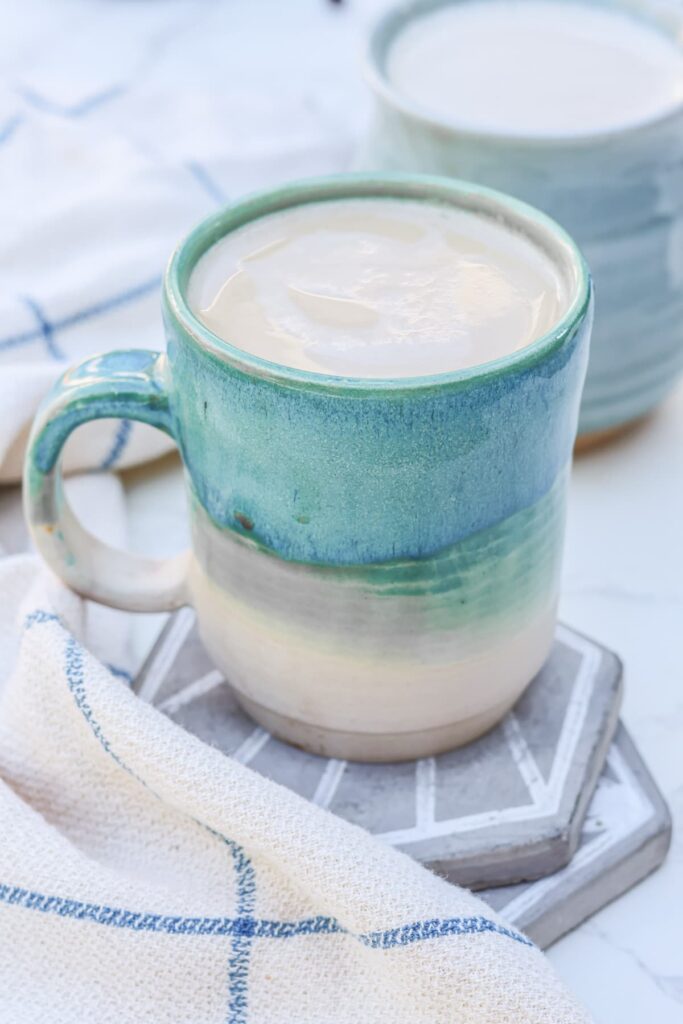 protein coffee in a blue ceramic mug