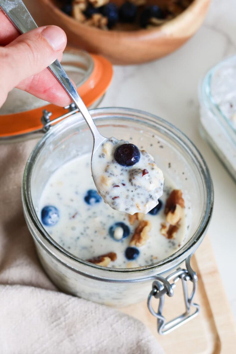 close up of high protein overnight oats with blueberries and walnuts